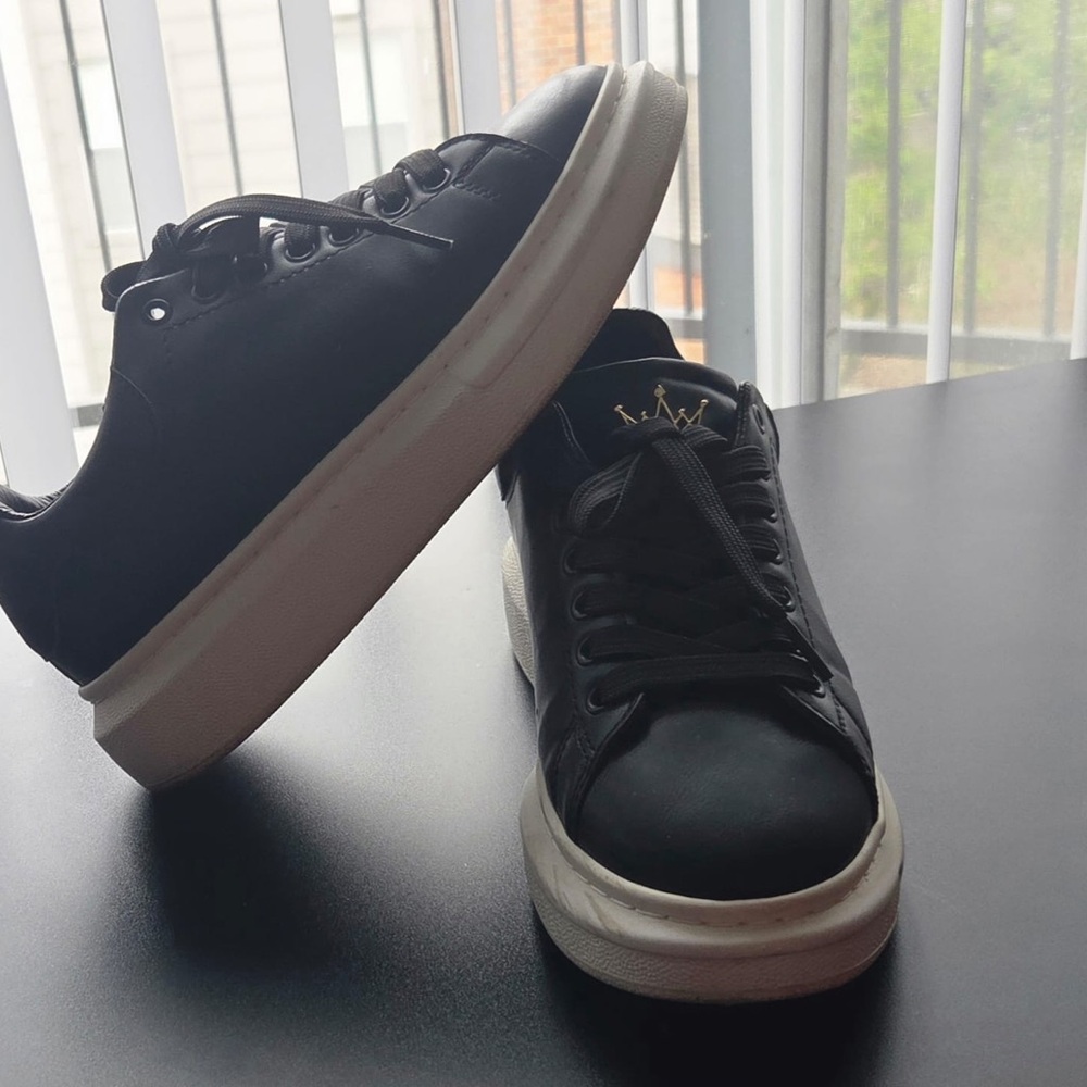 Men's Black Low-Top Sneakers with White Sole and Gold Crown Accent